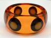 Evans 17 amber octopus eye bangle